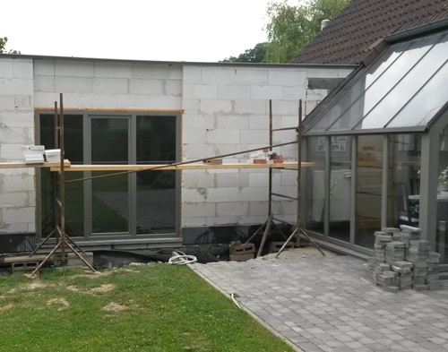 Transformation d'habitation avec une veranda